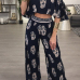 Stylish Dew Shoulder Printed Black Milk Fiber Two-piece Pants Set(Non Positioning Printing) Stylish Dew Shoulder Printed Black Milk Fiber Two-piece Pants Set(Non Positioning Printing)