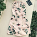 Amolapha Women Vintage Flora Printed Turn Down Collar Playsuits Buckle Sashes Waist Short Jumpsuit