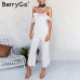 BerryGo Sexy backless off shoulder black jumpsuit women Tiered ruffle high waist jumpsuit romper Female casual overall femme