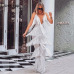 COSYGAL  Fringes Rompers Womens Jumpsuit Tassels Sexy Solid Playsuit White Chic Outfits Fashion Runway Jumpsuits For Women 2018