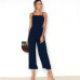 VIEUNSTA 17 Colors Women Strap Backless Long Jumpsuits 2018 New Fashion Back Bow Flare Leg Playsuit Summer Beach Loose Jumpsuit